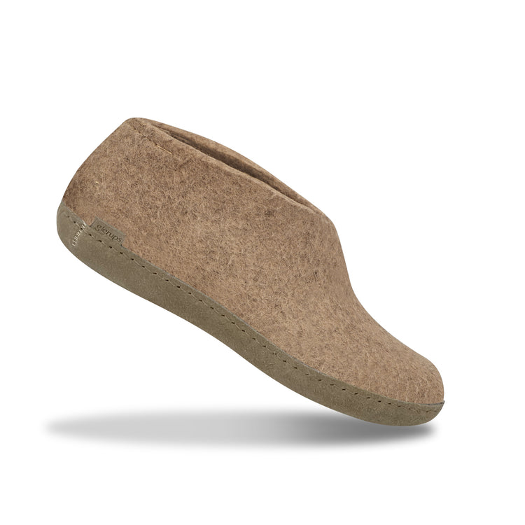 The leather shoe sand