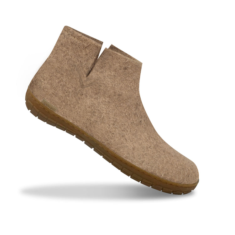 The honey rubber boot sand