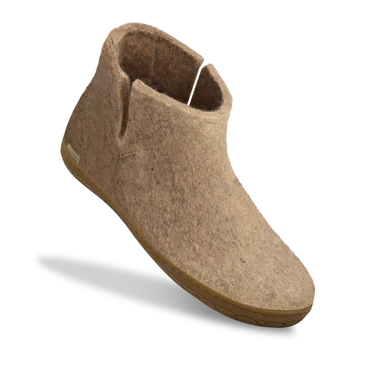 The honey rubber boot sand