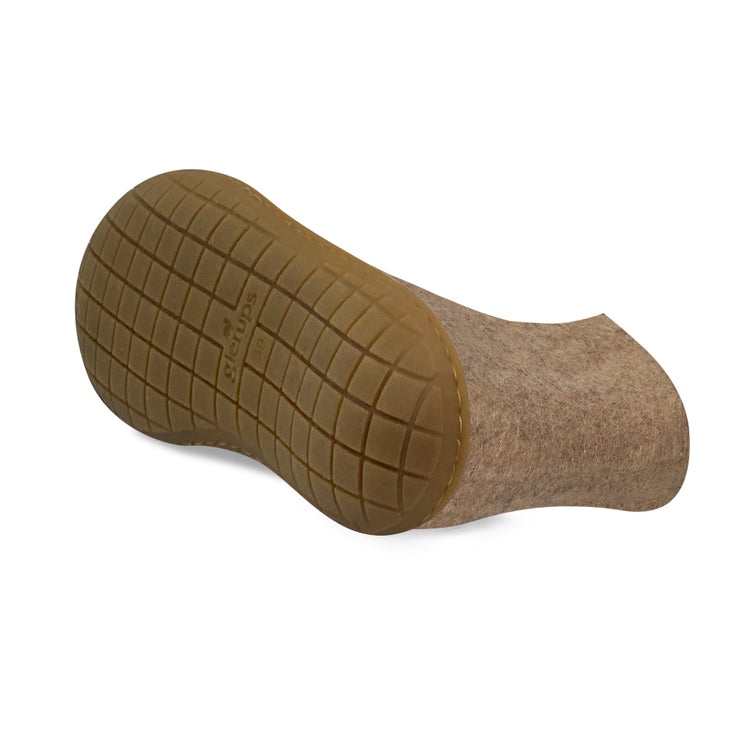 The honey rubber boot sand